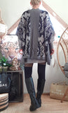 Poncho Cosmoda gris/noir