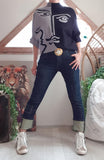 Pull Rostro gris/noir