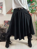 Jupe cloutée avec ceinture noire
