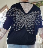 Pull noir Papillon