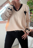 Pull beige Coeur noir