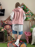 Veste sans manches Bonjour rose